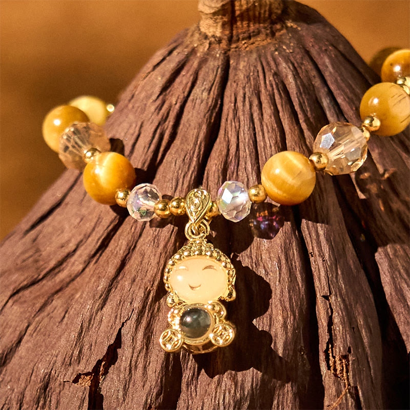 Yellow Tiger Eye Meditation Buddha Bracelet – In sunlight showing moving light band, dynamic chatoyancy