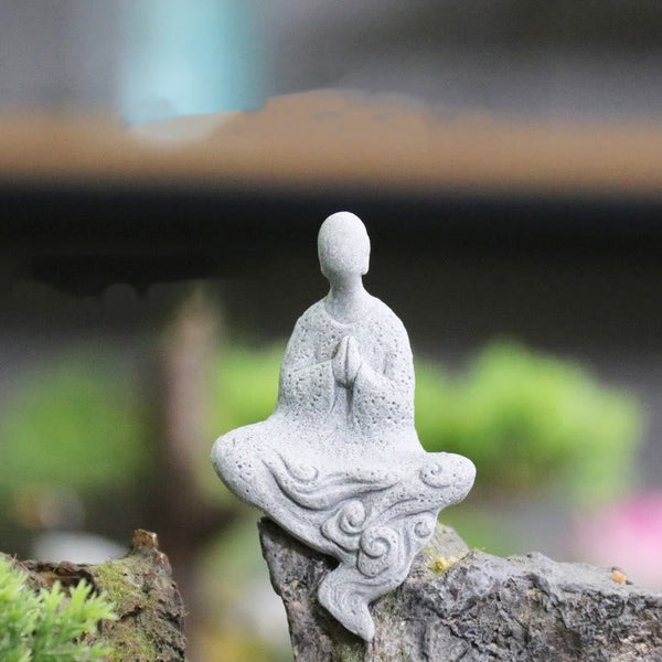 Meditation Buddha Monk Serenity Home Decoration – Harmonious sage statue in quiet repose, zen living space decoration