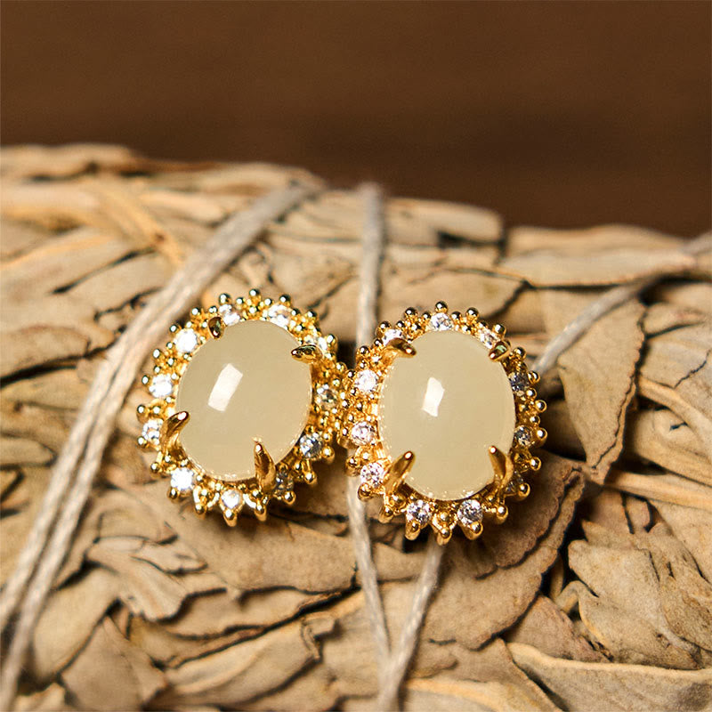 Hetian Jade Copper Earrings - dual angle on dried botanical with twine, warm organic styling