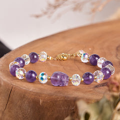 Natural Amethyst PiXiu Crystal Balance Bracelet – Purple amethyst and clear crystal beads with PiXiu charm on wood stump