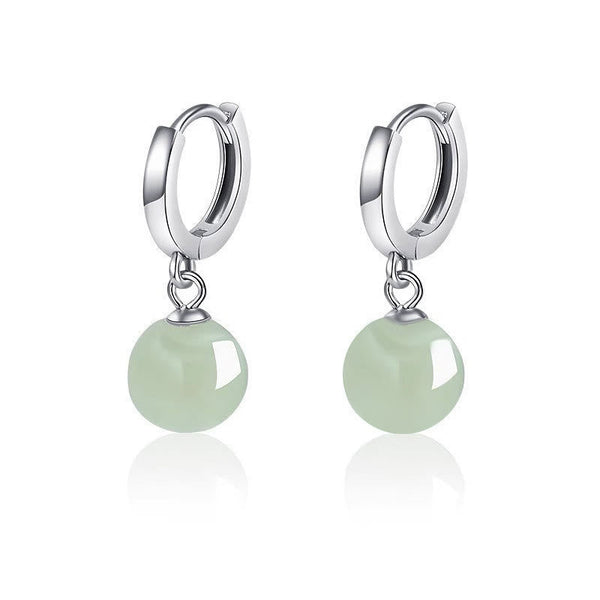 Round Jade Bead Prosperity Earrings – silver huggie hoops with translucent mint green jade beads, white seamless background, e-commerce front view