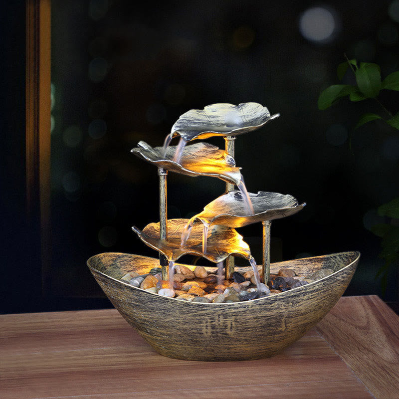 Lotus Leaf LED Waterfall Fountain - glowing tiers on wood at night, LED fountain decor