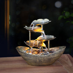 Lotus Leaf LED Waterfall Fountain - glowing tiers on wood at night, LED fountain decor