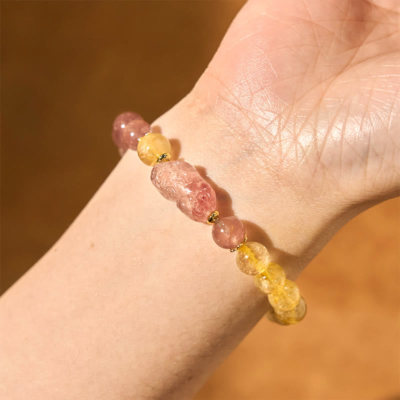 Strawberry Quartz PiXiu Rutilated Quartz Healing Bracelet – closeup wrist with pink PiXiu and rutile quartz, healing energy