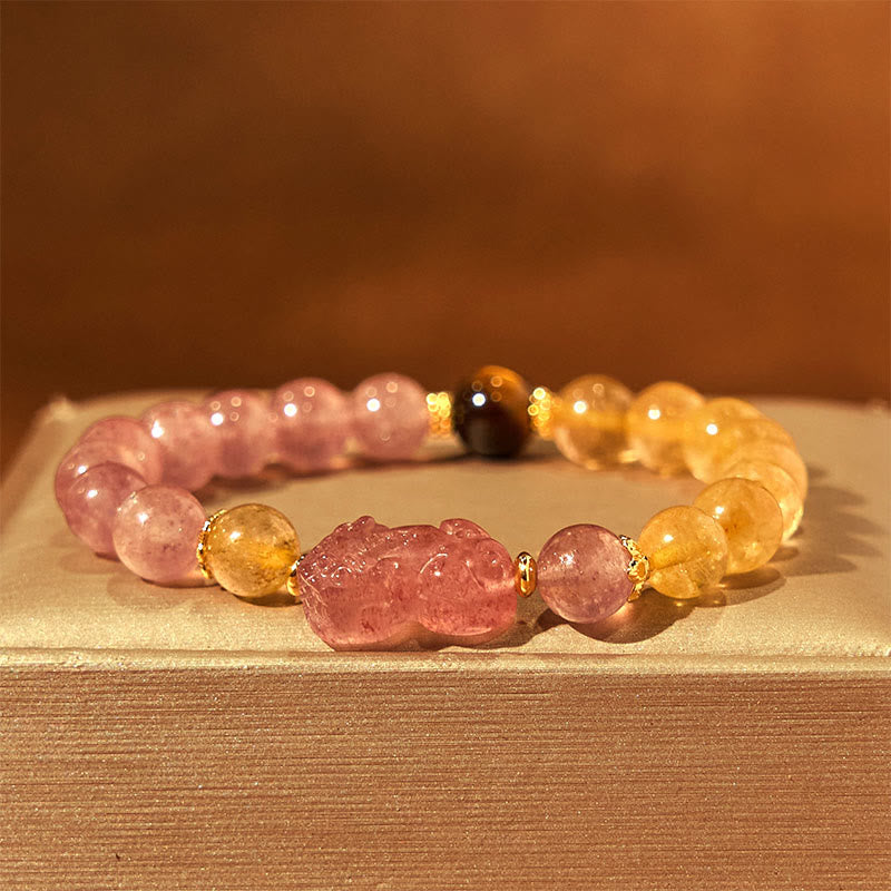 Strawberry Quartz PiXiu Rutilated Quartz Healing Bracelet – pink PiXiu with gold rutile beads on cream fabric, prosperity