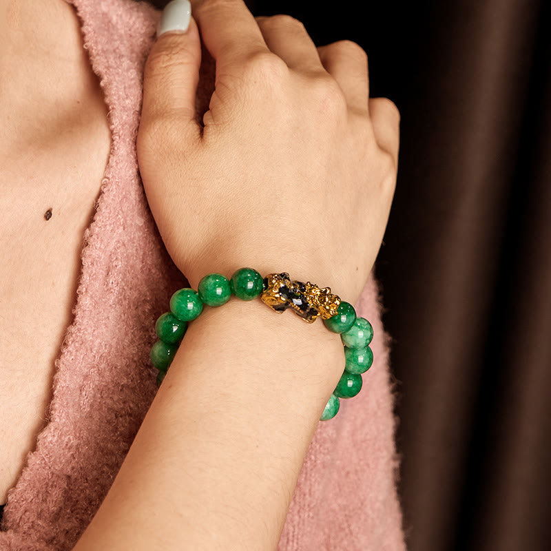 Feng Shui PiXiu Jade Protection Bracelet – Worn on wrist with pink knit sweater, green jade PiXiu protection bracelet