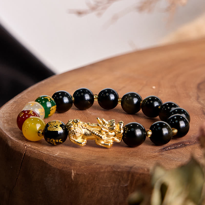 Gold Sheen Obsidian PiXiu Five Directions Gods of Wealth Bracelet – Gold PiXiu with multi-color wealth god beads on wooden stump