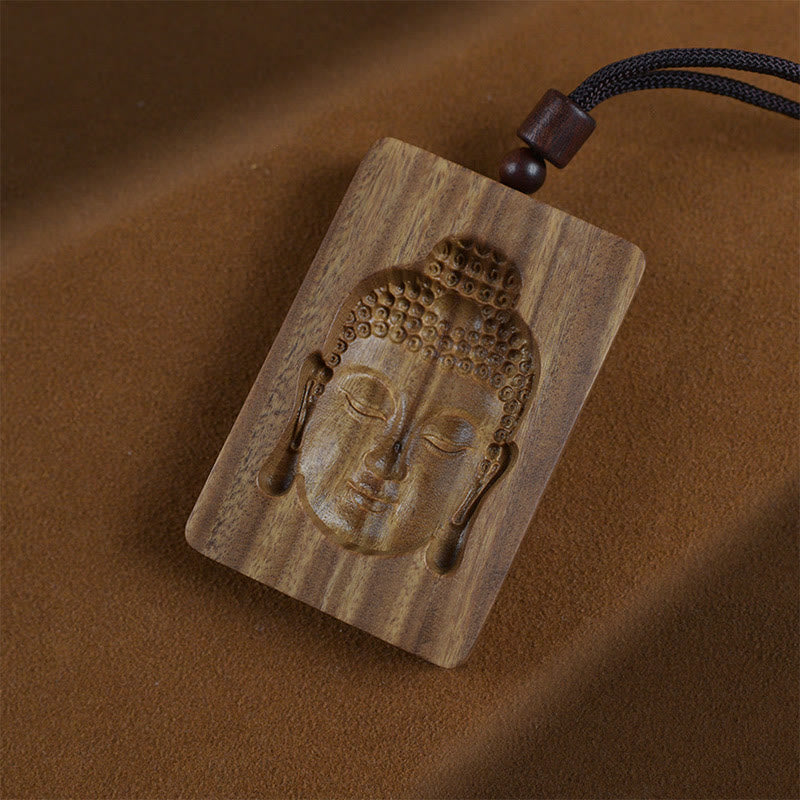 Green Sandalwood Buddha Necklace – carved wood Buddha pendant on black cord, spiritual jewelry