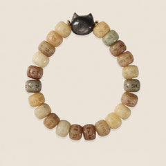 Bodhi Seed Silver Sheen Obsidian Cat Head Wisdom Bracelet – circular layout cream background, calm style