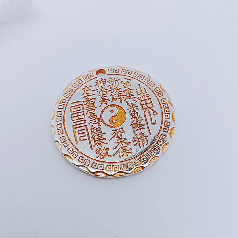 Mountain Ghosts Spend Money Yin Yang Bagua De - Taoist amulet flat lay on white bg, gold inscribed talisman coin pendant