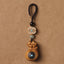 Sandalwood Om Mani Padme Hum Key Chain – natural tan wood pendant with cord, grounding calm