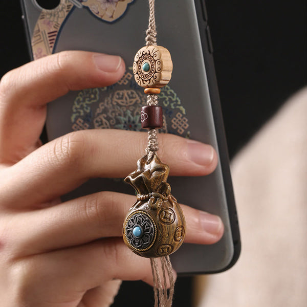 Sandalwood Om Mani Padme Hum Key Chain – wood charm hanging from phone, everyday protection