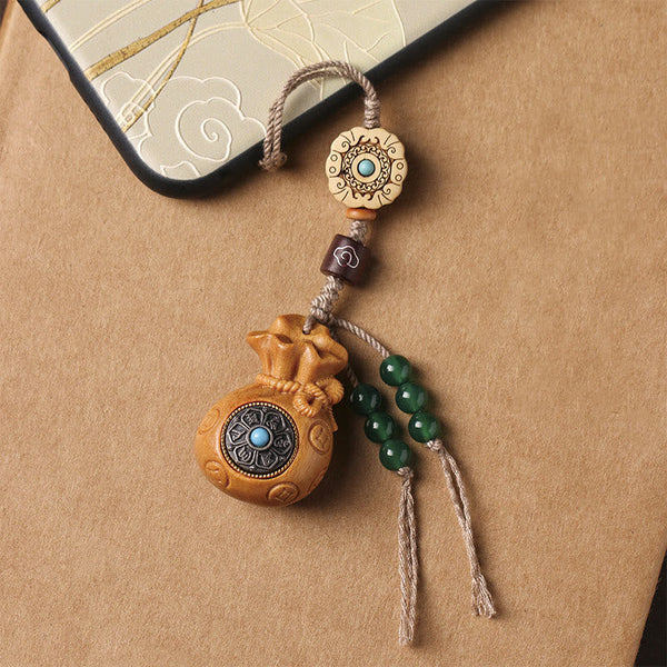 Sandalwood Om Mani Padme Hum Key Chain – charm attached to smartphone, daily protection