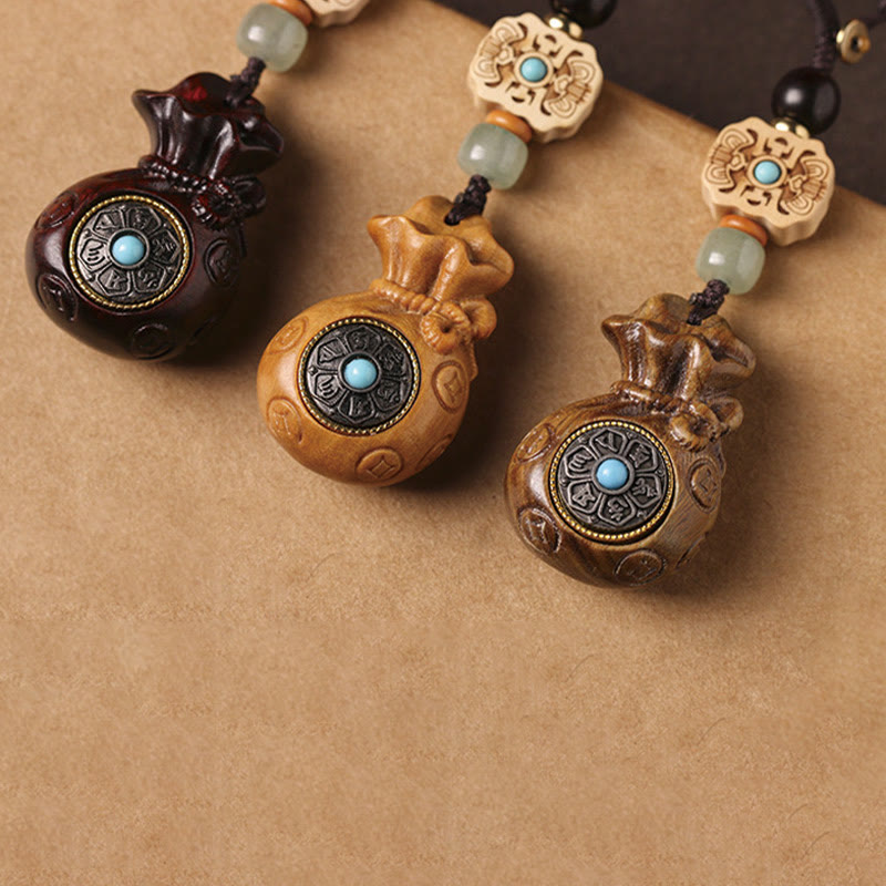 Sandalwood Om Mani Padme Hum Key Chain – three wood tone charms together, variety balance