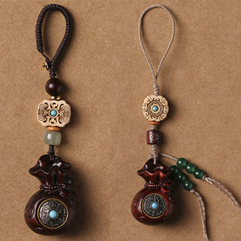Sandalwood Om Mani Padme Hum Key Chain – pair of dark wood charms, dual harmony grounding