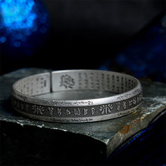 Om Mani Padme Hum Silver Cuff – Interior sutra text and lotus engraving visible, antique Tibetan mantra bracelet