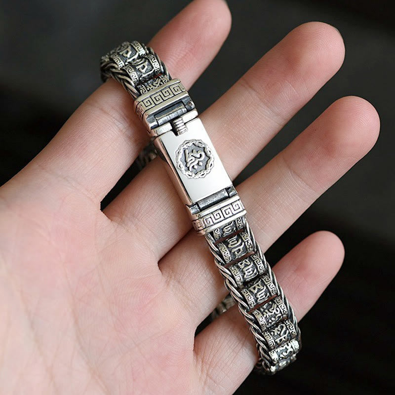 Om Mani Padme Hum Bracelet – in palm showing Om clasp detail, spiritual jewelry