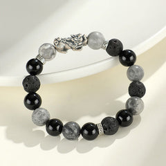 999 Silver PiXiu Bracelet – Side angle of silver PiXiu bracelet with black onyx, grey jasper and lava rock on white