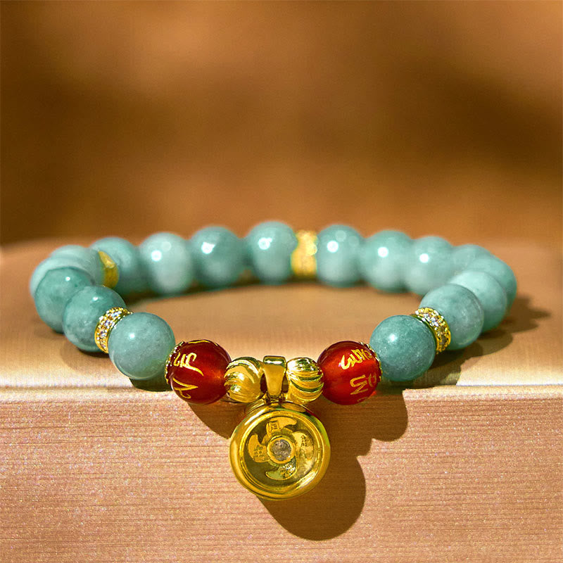 Green Jade Bracelet close-up with gold pendant charm, beaded bracelet