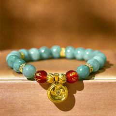 Green Jade Bracelet close-up with gold pendant charm, beaded bracelet