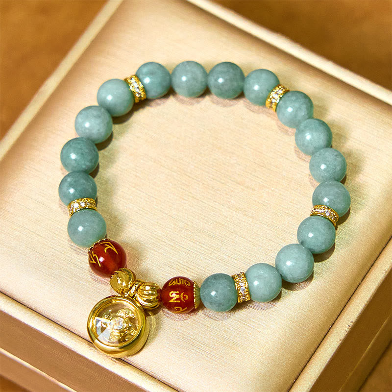 Green Jade Charm Bracelet displayed in luxury jewelry box, lucky bracelet