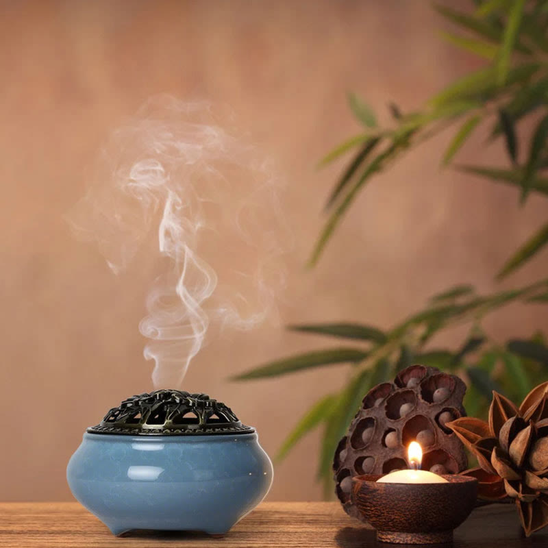 Ice Crackle Ceramic Incense Burner – Sky blue vessel with smoke, candle and lotus pod on wood, zen decor