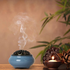 Ice Crackle Ceramic Incense Burner – Sky blue vessel with smoke, candle and lotus pod on wood, zen decor