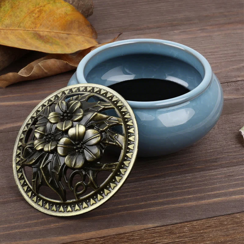 Ice Crackle Ceramic Incense Burner – Open lid revealing blue interior on dark wood, autumn leaves, healing