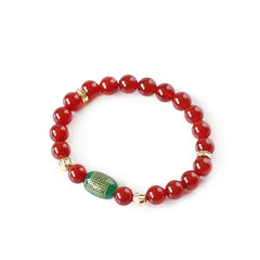 Red Green Agate Buddhist Sutras Calm Bracelet – overhead flatlay on white background, full circular bead layout, zen clarity