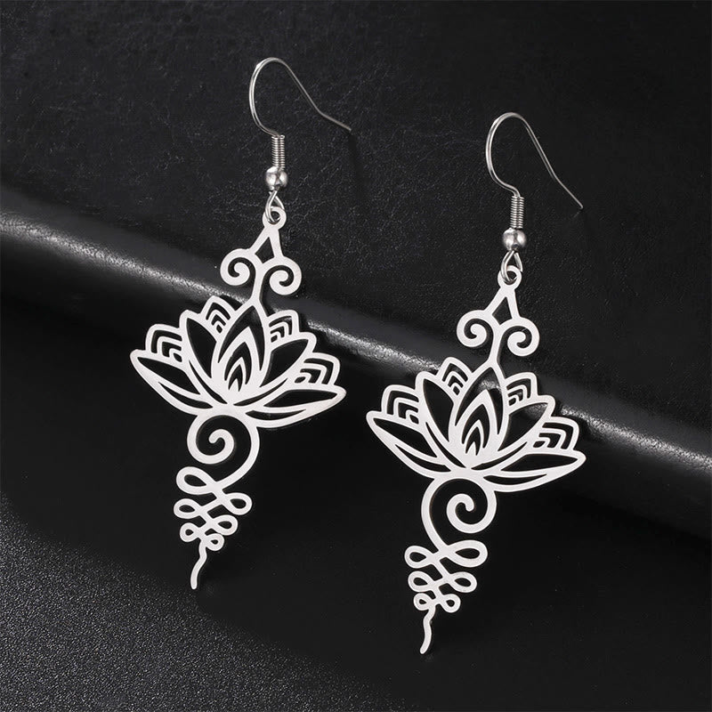 Hollow Lotus Stainless Steel Enlightenment Drop Earrings - silver lotus filigree pair on black leather, spiritual dangle