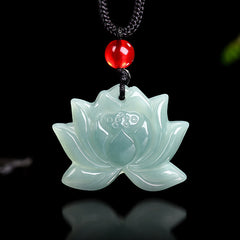 Lotus Flower Carved Jade Prosperity Necklace Pendant - carved lotus on black cord, front view on glossy dark surface, luck