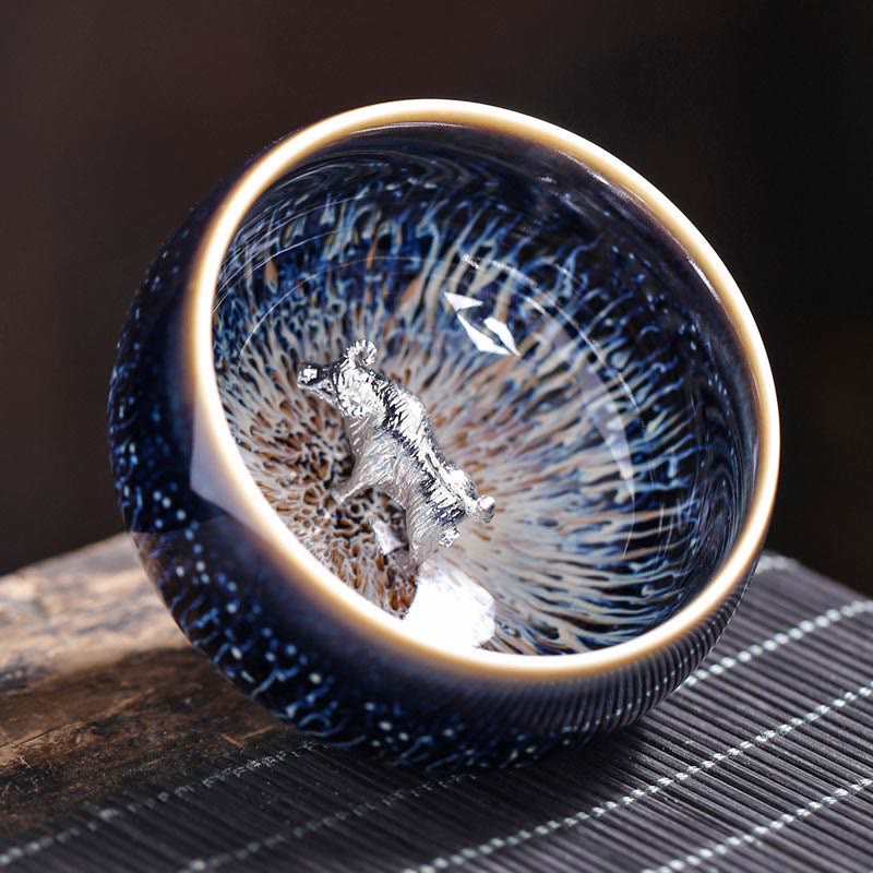 Jianzhan 12 Cup Set - top-down cup with silver dragon, starburst crystalline glaze, cream rim