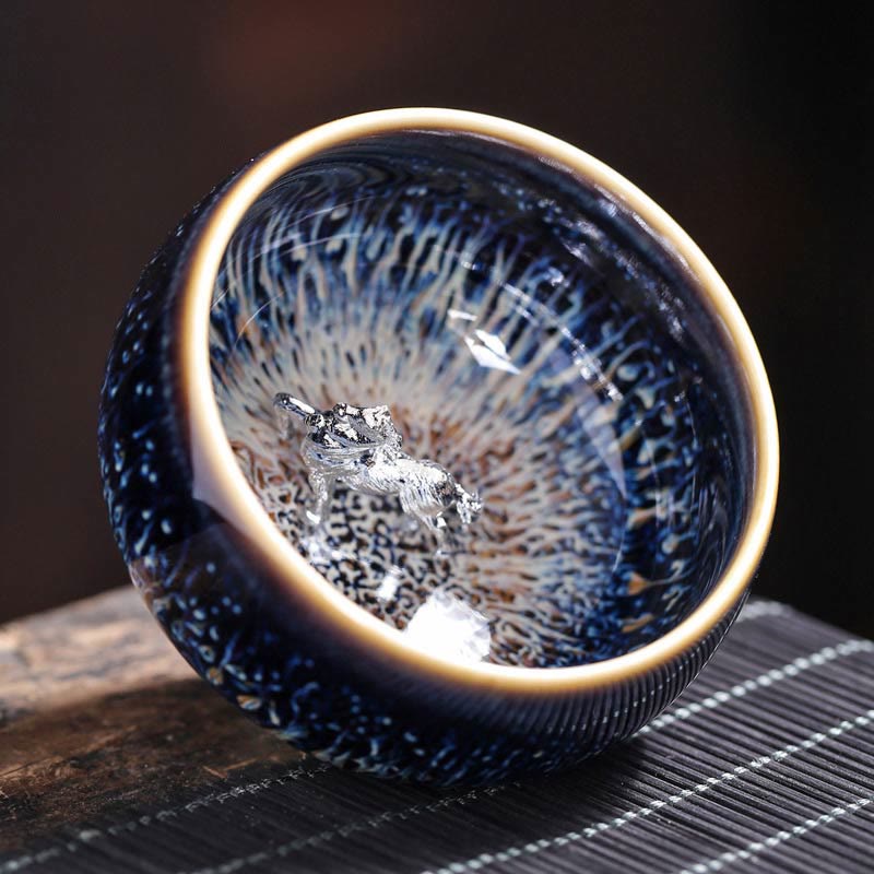 Jianzhan 12 Cup Set - top-down cup with silver ornament, cosmic blue glaze on wood