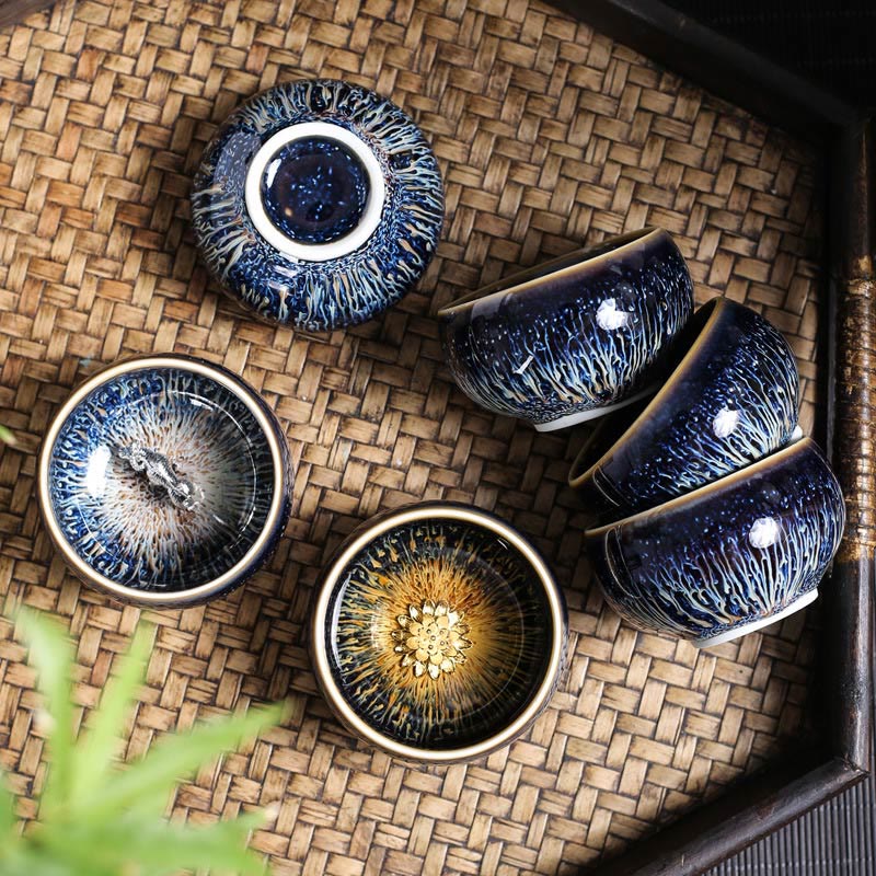 Jianzhan 12 Cup Set - six cups with silver crystalline glaze on woven rattan mat, gongfu ware