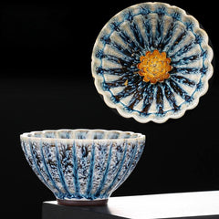 Jianzhan Lotus Ceramic Tea Cup dual view with gold lotus center, blue crystalline glaze, handmade