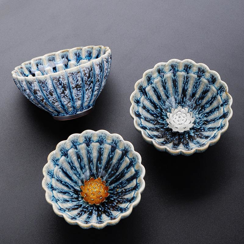 Three Jianzhan Lotus Ceramic Tea Cups with blue crystalline glaze, gold and silver centers, handmade
