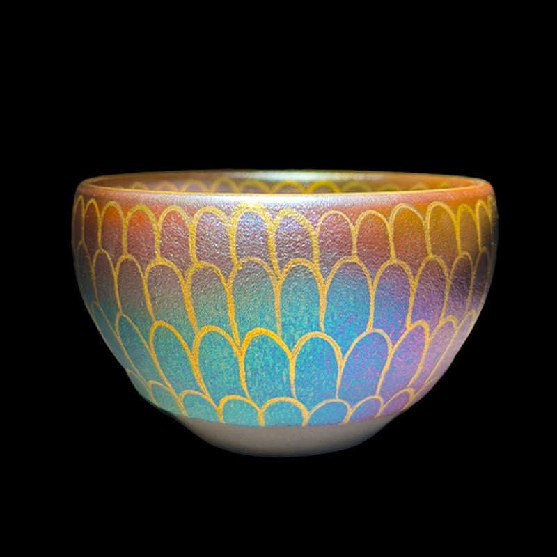 Jianzhan Lotus Tea Cup – gold-outlined scallop pattern with amber-to-turquoise gradient, black background