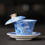 Dunhuang Ceramic Gaiwan Tea Set – Blue-and-white dragon gaiwan with gold accents lid ajar, Imperial Blue