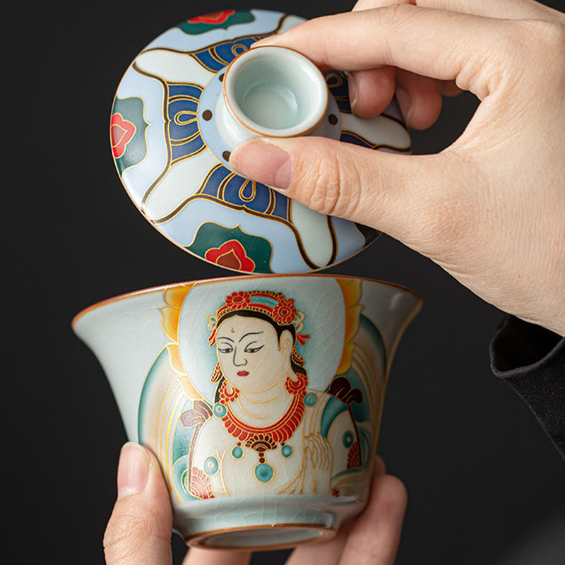 Dunhuang Ceramic Gaiwan Tea Set – Gaiwan lid lifted showing bodhisattva and gold outlines, Crackle Elegance