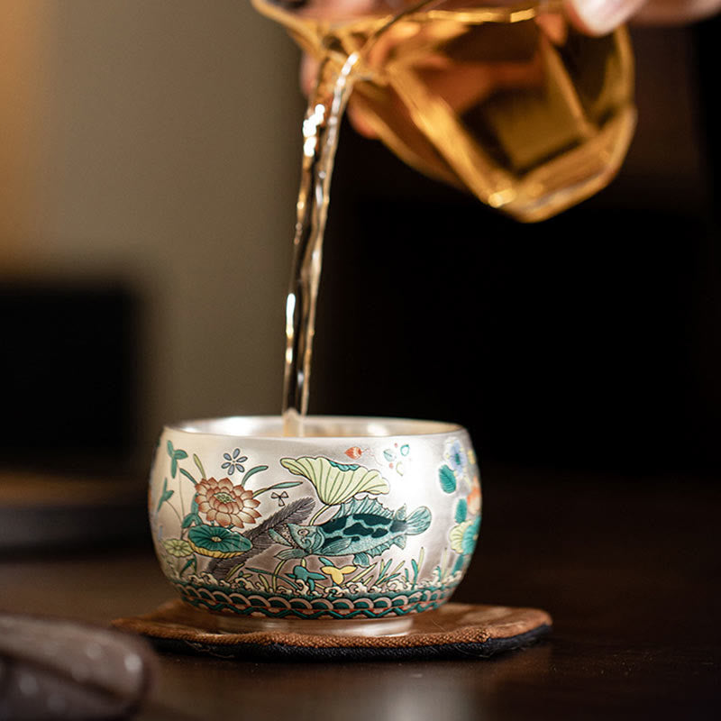 Ceramic Kung Fu Tea Cup Gift Set – Tea being poured from glass pitcher into decorated cup, Tea Ceremony