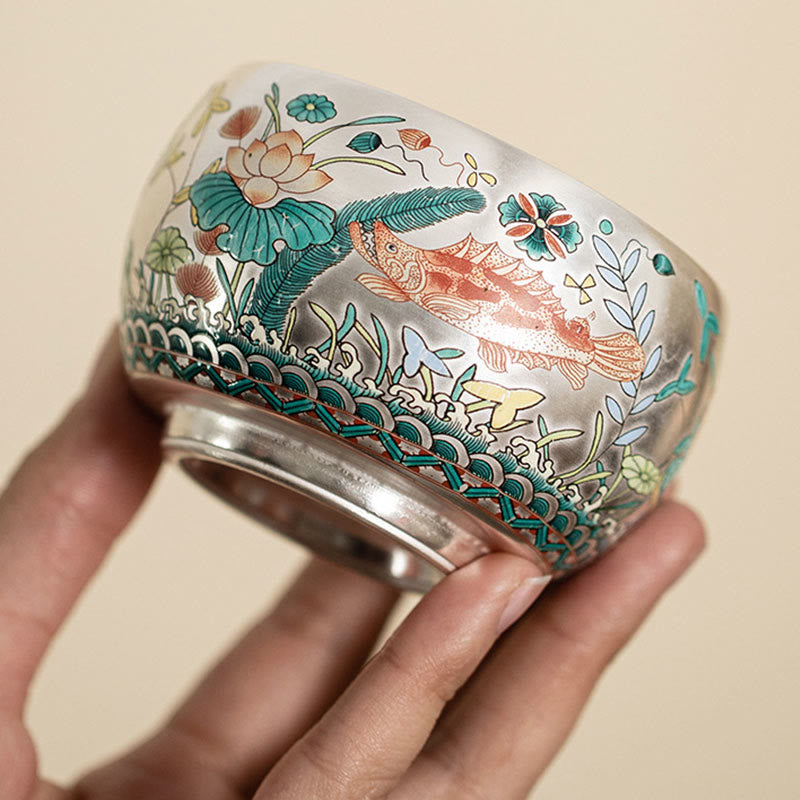 Ceramic Kung Fu Tea Cup Gift Set – Three-quarter view of koi fish cup with lotus and wave border, Vibrant Elegance