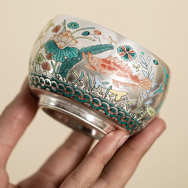 Ceramic Kung Fu Tea Cup Gift Set – Three-quarter view of koi fish cup with lotus and wave border, Vibrant Elegance