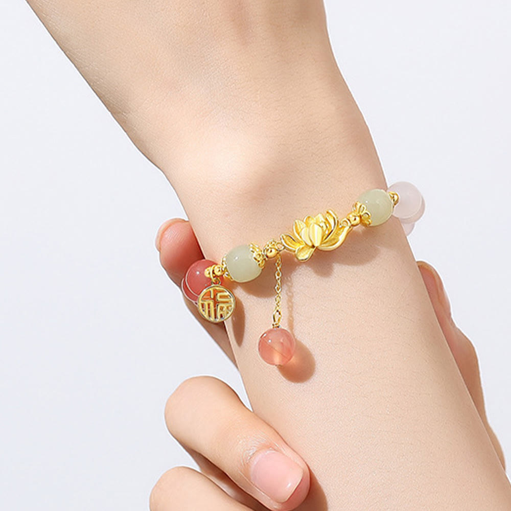 Agate & Hetian Jade Lotus Fu Bracelet – worn on wrist, gold lotus and fu pendant with pink and jade beads, charm bracelet