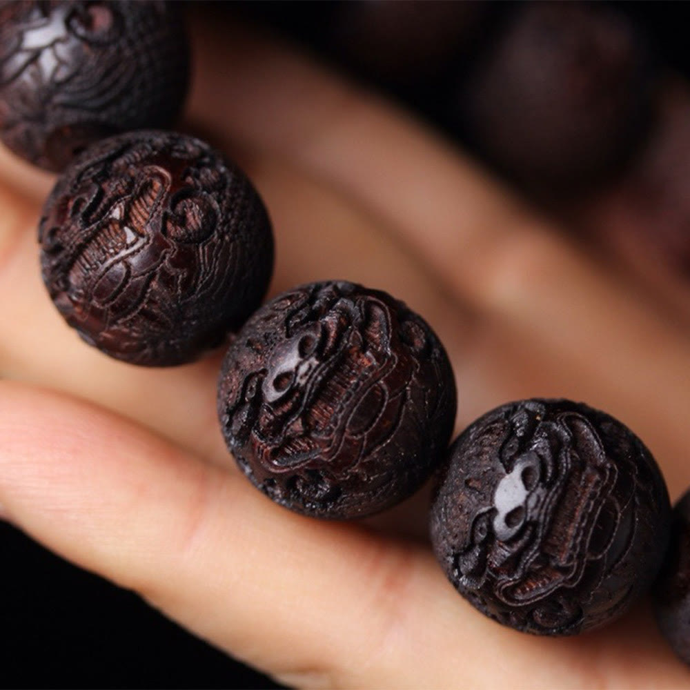Tibetan Rosewood Engraved Pixiu Warmth Healing Bracelet – extreme macro of rosewood grain and Pixiu carving, natural warmth bracelet