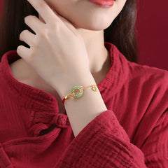 Silver Jade Koi Peace Buckle – side profile showing disc thickness and silver rim craftsmanship