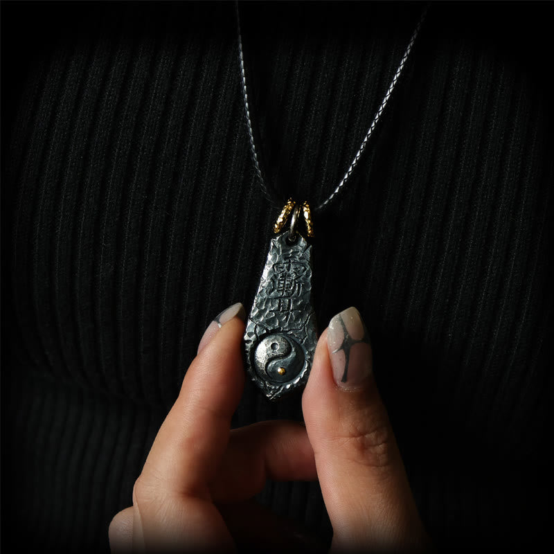 999 Sterling Silver Big Dipper Yin Yang Necklace - Oxidized silver pendant with Taoist engraving held by hand, artisan necklace