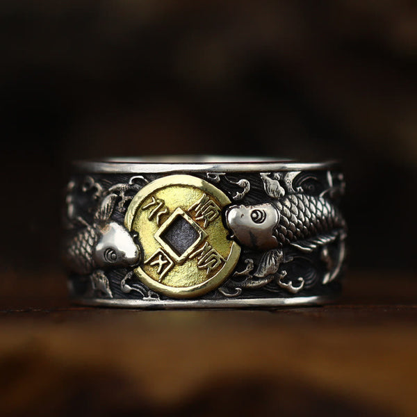 925 Silver Koi Fish Copper Coin Ring – frontal view, twin koi fish and Chinese lucky coin, oxidized silver, dark wood