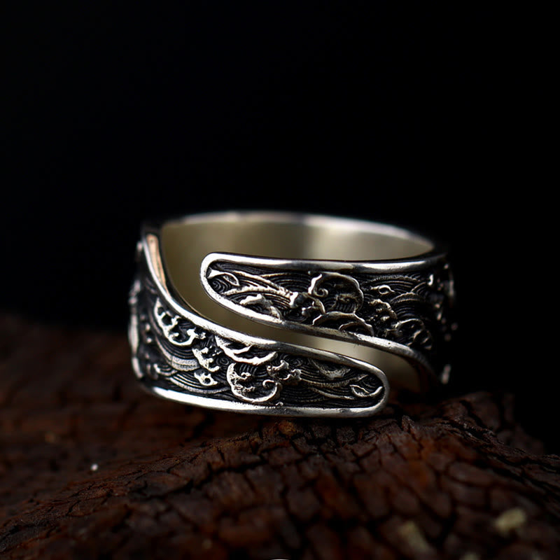 925 Silver Koi Fish Copper Coin Ring – adjustable open cuff with wave cloud pattern, overlapping bands, dark wood, low angle