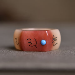 Camel Bone Om Mani Padme Hum Ring - Faceted band with coral-to-ivory gradient and turquoise dot, carved ring