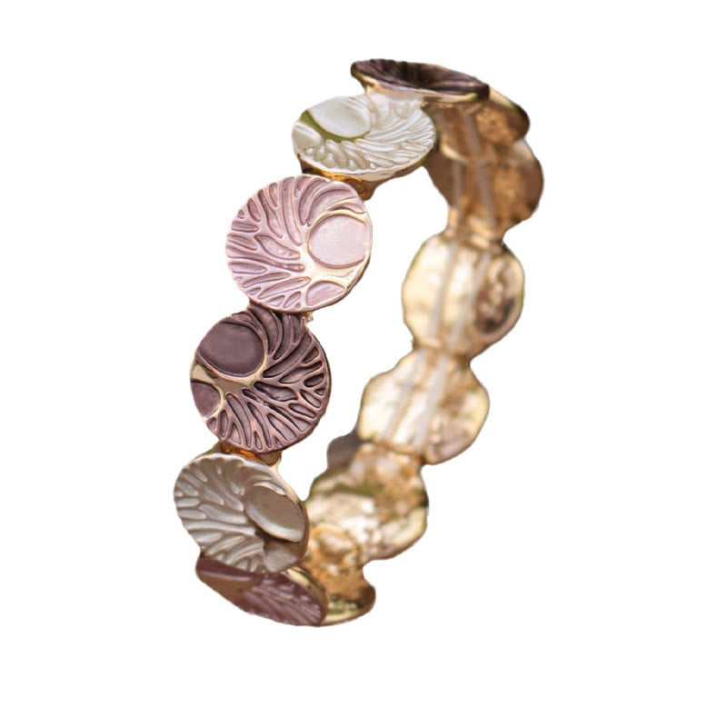 Tree of Life Enamel Alloy Bracelet – dusty rose and mauve enamel on white background, three-quarter angled